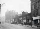 Pinstone Street showing No. 119 Singer Machine Co. Ltd. and No. 121 Neville Reed Ltd., tailors