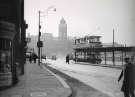 Tram on Exchange Street looking towards clock tower of Old Town Hall, Waingate