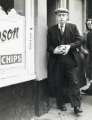 Man exiting fish and chip shop on Duke Street