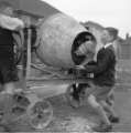 Children playing in cement mixer