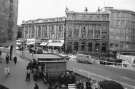 High Street showing the construction site for Castle Square (The Hole in the Road) showing (bottom) newspaper kiosk and (centre) Midland Bank Ltd.