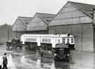 View: s46055 Cravens Ltd., rolling stock manufacturers, Acres Hill Lane showing coach on transport wagon for dispatch