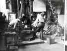 View: s46110 Jeffrey and 'Tucker' Wilkinson working with a 7 cwt ring and disc hammer, Jonas and Colver, Novo Steel Works, Bessemer Road, Attercliffe