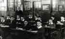 View: s46112 School class, possibly Meersbrook Bank School, Derbyshire Lane showing (top left) Mr Edward Snelgrove (c.1859-1934), headmaster