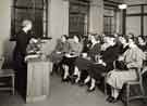 View: s46136 Mrs Vollens and a class of children's librarians, Central Library, Surrey Street