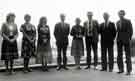 View: s46153 Winners and judges of a Libraries staff quiz pictured outside the rear of the Central Library