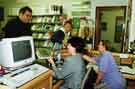 View: s46154 Lesley Gunter (sitting left) and Penny Sunderland (sitting right), librarians in the Sports Library, Central Library