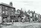 View: s46171 Attercliffe Road showing No. 663, William Millington, tobacconist, E.S. Fidler, watch maker, W.H. Chapman, general dealer  c.1895 - 1900 by Artist Walter Revill