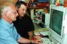 View: s46450 Ken Pickering (left) and Stephen Johnson (right) working on a computer in the Sheffield Information Service, Central Library, Surrey Street