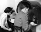 View: s46459 Telephone Enquiry Service, Commerce and Technology Library, Central Library, Surrey Street showing librarians, Philip Colehan and Maureen Oates