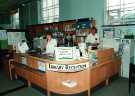 View: s46466 Library reception, Sheffield Information Service, Central Library, Surrey Street showing (right) library assistant, Ian Holdsworth