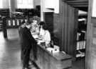 View: s46477 Commerce and Technology Library, Central Library, Surrey Street showing (right) library assistant, Jean Clarke 