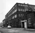 View: s46549 Arundel Street showing (centre) No. 72  Saville Press Ltd., printers and (right) Arundel Forge, Butcher Works