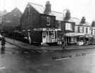 View: s46556 Bellhouse Road showing (l. to r.) No. 44 Abbey National Building Society; No. 42 D. O'Brian, fish and chip shop; No. 40 Warwick's, fishing tackle shop and Henry Wigfall and Son Ltd.,