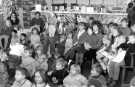 View: s46629 Children watching a Punch and Judy show, Central Children's Library, Central Library, Surrey Street 