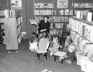 View: s46632 Storytime, Central Children's Library, Central Library, Surrey Street showing (centre) library assistant Elaine Jones