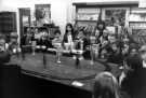 View: s46633 Model railway demonstration, Central Children's Library, Central Library, Surrey Street showing (back right) librarian Barbara Sorby