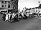 View: s46802 Health Service protest marchers on Pinstone Street and junction with (right) Surrey Street, led by (first left) Councillor William 'Bill' Owen JP