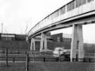 Connecting footbridge over M1 motorway, Woodall services looking west