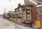 View: sypte00465 South Yorkshire Passenger Transport Executive (SYPTE).  Moorthorpe railway station, Barnsley Road, West Yorkshire showing (centre) The Mallard public house