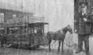 Jimmy Taylor (right) on his retirement from Sheffield Corporation Tramways. Pictured (left) driving his first tram, a one horse vehicle on the Brightside route