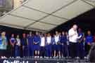 View: t11586 Olympic torch event in the Peace Gardens for the 2012 Olympics showing (right) Howard Pressman introducing Olympic athletes