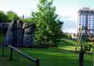 View: t11614 Playground in the Ponderosa Park showing (right) Martin Street Flats