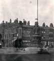 View: t11916 Barkers Pool with (centre) Barkers Pool War Memorial and Henry Dobson, printers, (left) Manchester Hotel, Nos. 4 -6 Division Street and (right) Holly Street