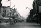 View: t11931 The Moor looking towards Pinstone Street showing (left) Nos. 76 - 90 John Atkinson Ltd. and Nos. 31 - 33 Burton Montague Ltd., tailors