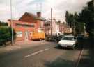 View: t12151 Normanton Spring Road showing (left) Nos. 36 - 38 Manor Press Ltd., printers and graphic designers 