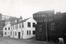 View: t12270 Trippet Lane showing (centre) junction with Bailey Street and (left) John Barker (Electrical Contractors) Ltd., electrical engineers, Birch HALL