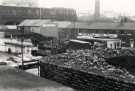 View: t12271 View of (centre) Shortall Ltd., upholsterers, and (foreground) E. Bonsall, steel and non ferrous metal merchants, No. 13 Maltravers Street