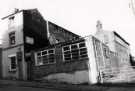 View: t12411 Grade II listed cutlery workshops, No. 56 Garden Street showing G. H. Stansfield, forger and John C. Swallow, mark maker