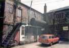 View: t12472 Leah's Yard, former premises of Henry Leah and Sons, Cambridge Stamping Works, No. 20 Cambridge Street showing (right) KH Joinery