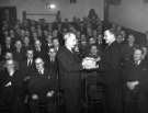 Retirement presentation by Alfred Roebuck, Works Director to Eric Gardner, Pattern Shop in the old cinema room, main office block, East Hecla Works, Hadfields Ltd.