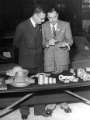 Precision castings, Hadfields Ltd. showing (right) Dr. R. J. Rait, research controller