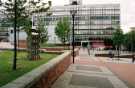 View: t13043 Entrance to Owen Building, Sheffield Hallam University, Howard Street showing (left) memorial to entertainer Marti Caine