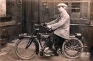 Mr T. Dunbar Cooke on his motorcycle in rear yard of No. 229 London Road