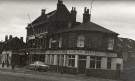 Albion Hotel, Nos. 2- 4 Earsham Street showing (left) No. 16 John Heath and Sons, funeral directors,