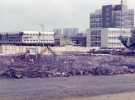 Construction site for Manpower Service Commission, Moorfoot showing (centre left) Yorkshire Bank, No. 139 The Moor and (right) Midland Bank offices, Deacon House, Eyre Street 