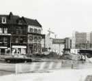 Henry Playfair Ltd., shoe shop, No. 2 Ecclesall Road and Nos. 206 - 210 Yorkshire Penny Bank, The Moor, Moorfoot showing (right) Telephone House