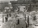 View: t14763 Park Hill Redevelopment Area, Part 1: [Park Hill Flats construction]. Foundations for 2 storey shops looking towards Duke Street and (top left) Embassy Court Flats and (top right) Bard Street flats