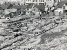 Park Hill Redevelopment Area, Part 1: [Park Hill Flats construction]. Single and double storey shop foundations showing west end