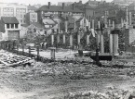 View: t14773 Park Hill Redevelopment Area, Part 1: [Park Hill Flats construction]. Block A foundations showing (back) Bard Street Flats, Duke Street