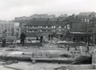 Park Hill Redevelopment Area, Part 1: [Park Hill Flats construction]. Roof of 2 storey shops showing (top) Bard Street Flats