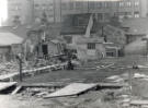 View: t14783 Park Hill Redevelopment Area, Part 1: [Park Hill Flats construction]. Foundations for 1 and 2 storey shops showing the rear of houses on Duke Street and Bard Street Flats