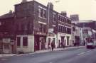 Mortons cutlers, Nos. 100 - 104 West Street showing (left) Pizzeria La Taverna, No. 2 Bailey Lane