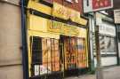 Shops on Abbeydale Road showing No. 438 Chinese Fireworks and No. 436 Star Carpets, carpet dealers