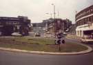 View from Tenter Street of Broad Lane roundabout looking towards (centre) Broad Lane showing (right) Garden Street and Hallamshire Motor Co. Ltd., car dealers and (left) Kenning Tyre Services 