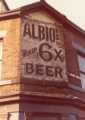 Brewery advertising sign above shop on No. 72 Asline Road and corner of Holland Road